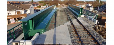 The deck is a snug fit to the abutment to prevent strain in the track