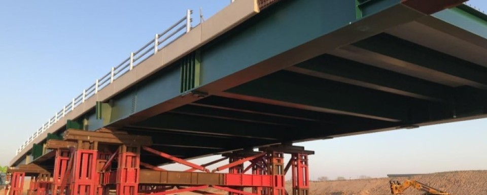 Steel span supported in the centre prior to attaching cable stays 