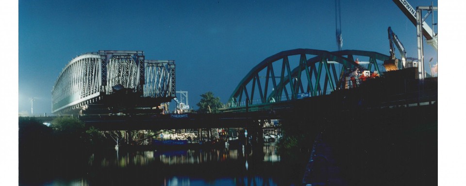 The two old spans are removed and the new one placed in