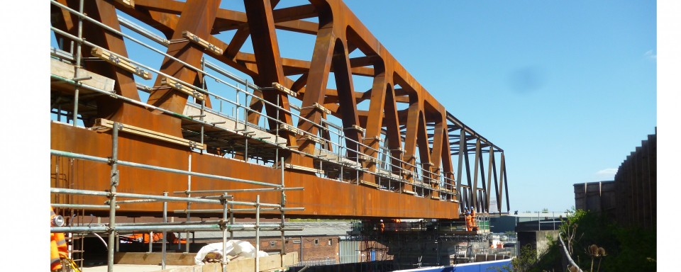 The bridge is almost at maximum cantilever before it reaches the other side