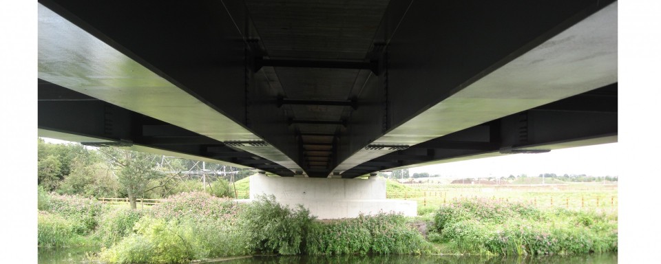 An underside view showing the slight arch in the beams