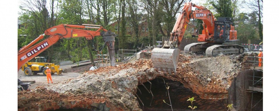 Andover Road Bridge, Winchester breaking out the old arch, showing the layered arch rings