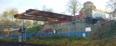 The main girders on their journey over the tracks