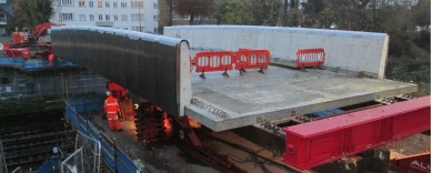 A conrete stitch will be poured over the steel loops where the deck meets the parapet to hold them together