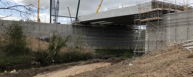 Precast concrete beams sat on concrete abutments