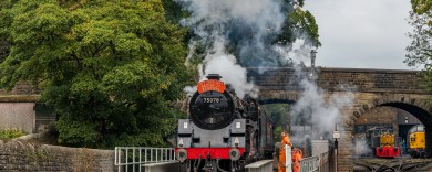 Steam train passing over UB27